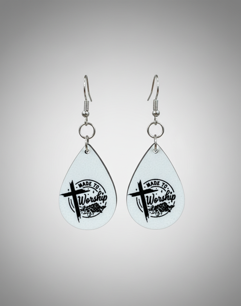 Made to Worship Earrings by Whittled Grace Gifts – teardrop earrings featuring a cross and the words ‘Made to Worship.’ Christian faith jewelry inspired by Psalm 95:6.
