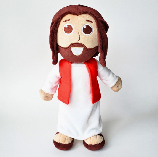 Close up of Talking Jesus Doll plush Christian toy designed to teach children Bible verses and faith