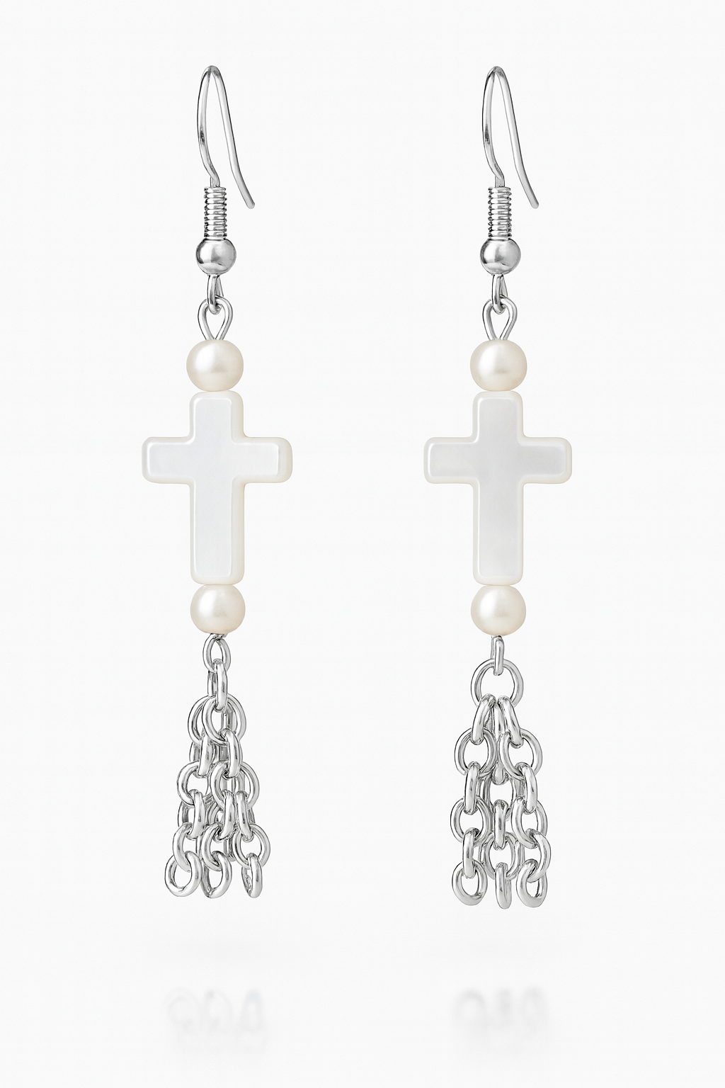 Faith-inspired Broken Chain Earrings featuring white cross and pearl accents with silver chain dangles — symbolizing freedom and grace through Christ.