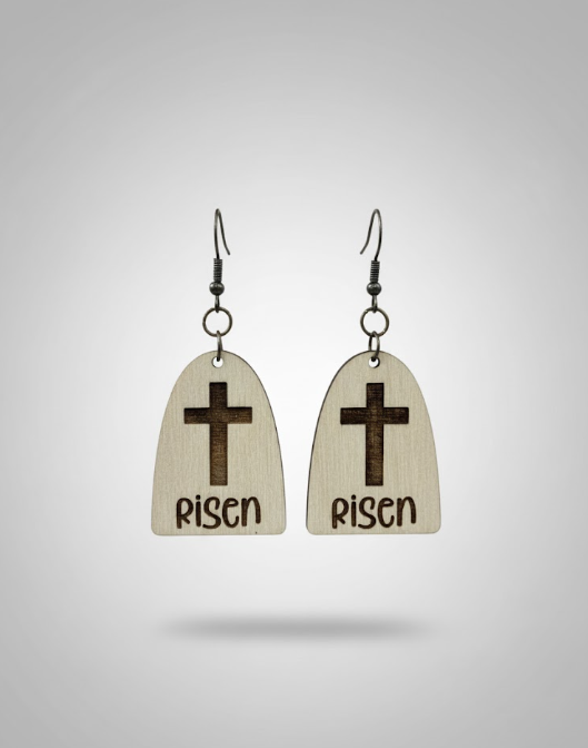 He Is Risen Earrings by Whittled Grace Gifts — wooden cross earrings engraved with the word “RISEN,” inspired by Matthew 28:6, symbolizing resurrection and faith.