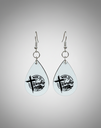 Made to Worship Earrings by Whittled Grace Gifts – teardrop earrings featuring a cross and the words ‘Made to Worship.’ Christian faith jewelry inspired by Psalm 95:6.
