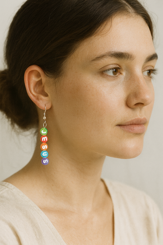 Faith-inspired Name Above All Earrings featuring colorful letter beads spelling “JESUS” — letter colors may vary. Lightweight, hypoallergenic, and full of joy.