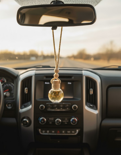 “Car essential oil diffuser with Joyful Tidings tag, sweet berry scent.”