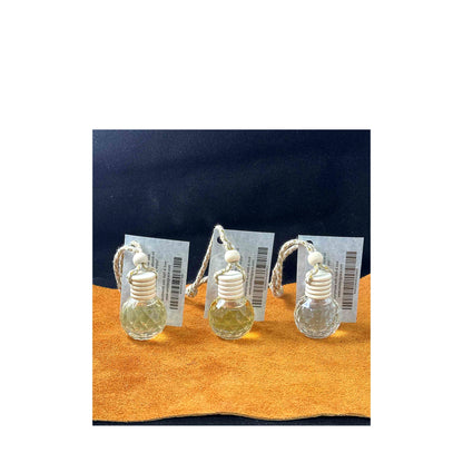 “Car diffuser with Renewed by Grace tag, tropical hibiscus scent.”